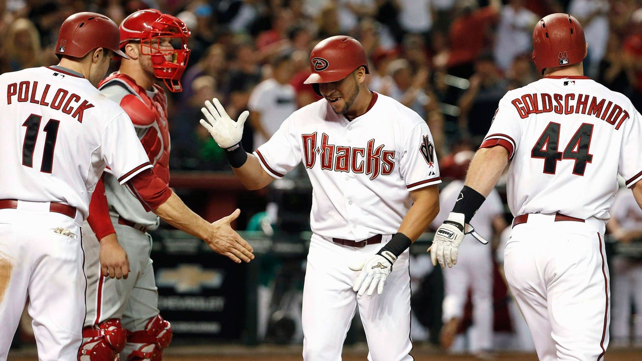 Surprising D-backs lead NL in scoring